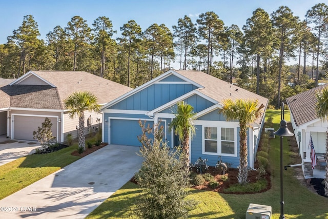 view of front facade featuring a garage and a front lawn