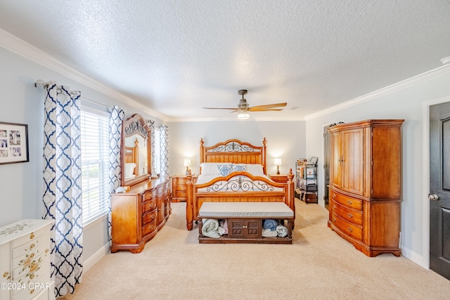 bedroom with a textured ceiling, ornamental molding, and light carpet