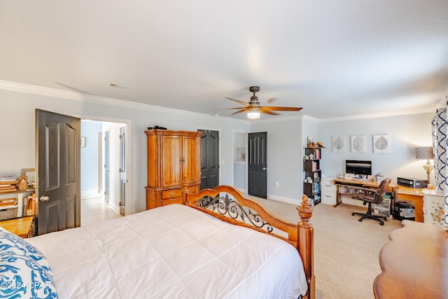 bedroom with a textured ceiling, ceiling fan, light colored carpet, and crown molding