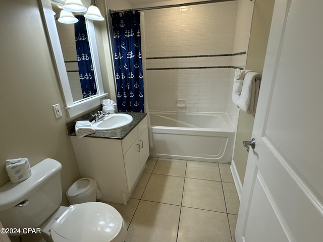 full bathroom featuring tile patterned flooring, vanity, shower / tub combo with curtain, and toilet