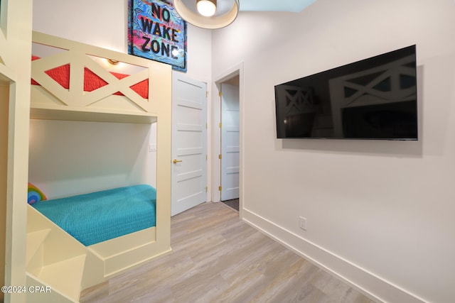 bedroom featuring hardwood / wood-style floors