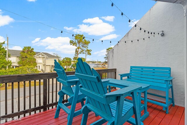 exterior space with a patio area and a wooden deck