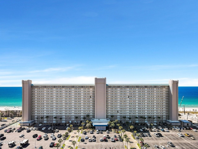 bird's eye view featuring a beach view and a water view