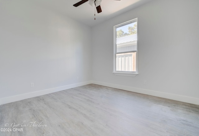 unfurnished room with ceiling fan and light hardwood / wood-style floors