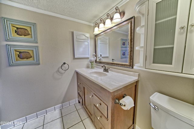 bathroom with crown molding, vanity, a textured ceiling, tile patterned floors, and toilet