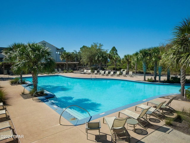 community pool with a patio