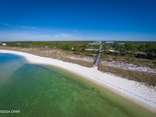 birds eye view of property featuring a view of the beach