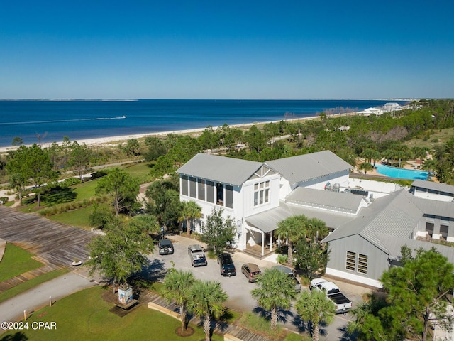 aerial view featuring a view of the beach and a water view