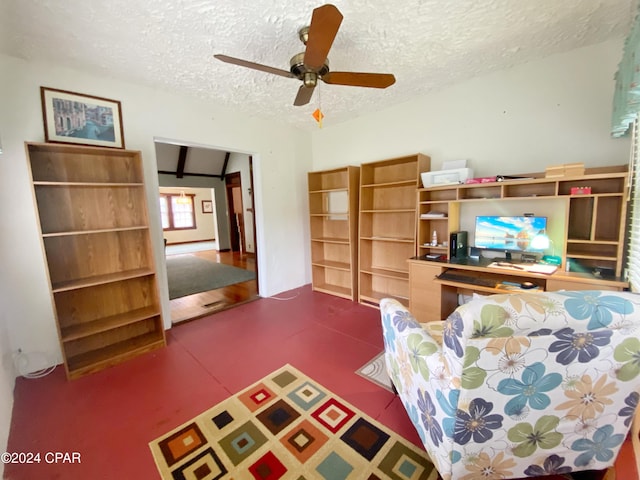 unfurnished living room with ceiling fan, a textured ceiling, and lofted ceiling