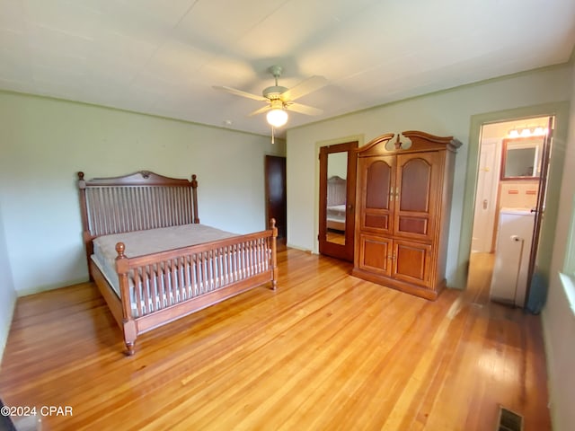 bedroom with ceiling fan and light hardwood / wood-style flooring