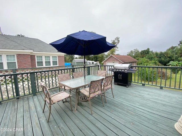 wooden terrace with grilling area