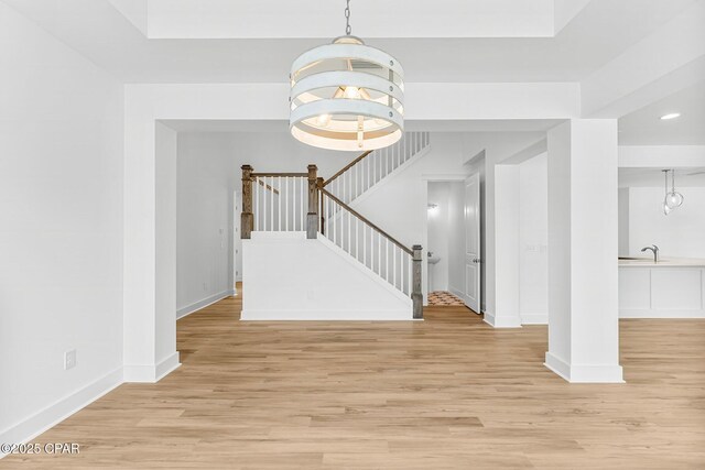 unfurnished living room with light hardwood / wood-style flooring