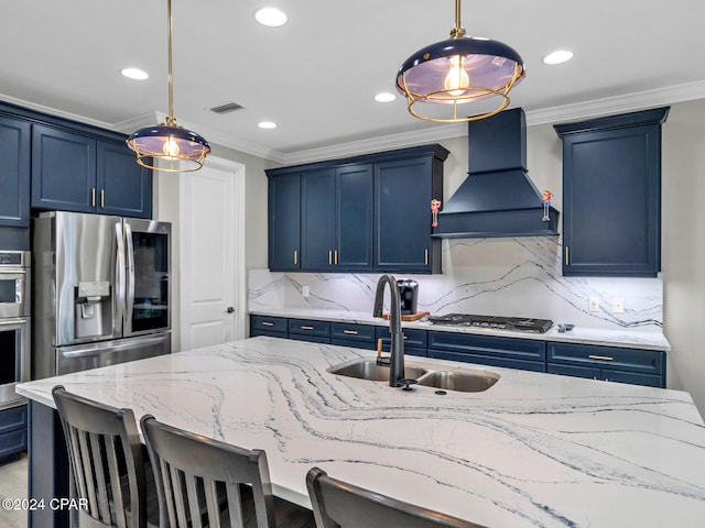 kitchen with stainless steel appliances, premium range hood, and blue cabinets