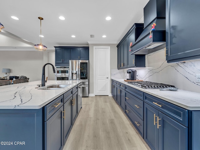 kitchen with light hardwood / wood-style floors, appliances with stainless steel finishes, tasteful backsplash, hanging light fixtures, and blue cabinets