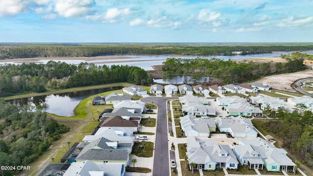 bird's eye view with a water view