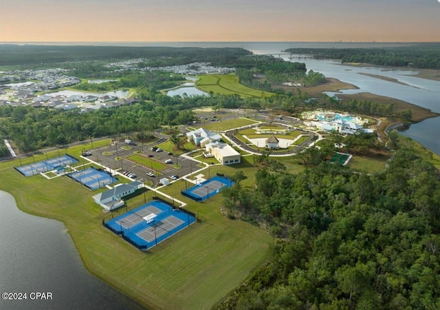 aerial view at dusk with a water view