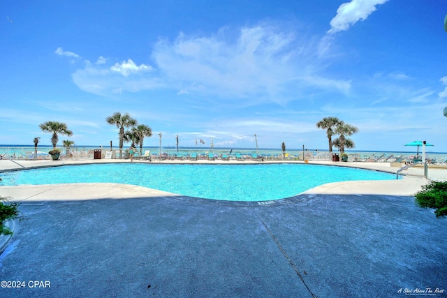 6201 Thomas Dr Unit 302, Panama City, FL 32408 - pool with fence and a patio area