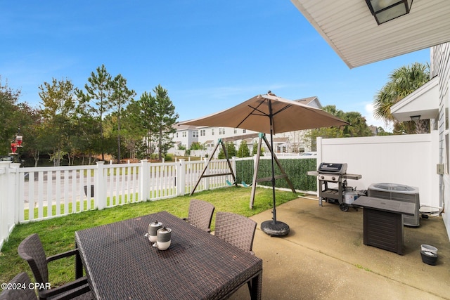 view of patio / terrace with a grill