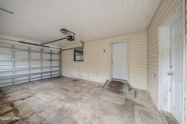 garage featuring a garage door opener