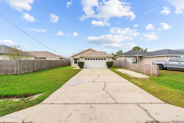 ranch-style house featuring a garage and a front yard