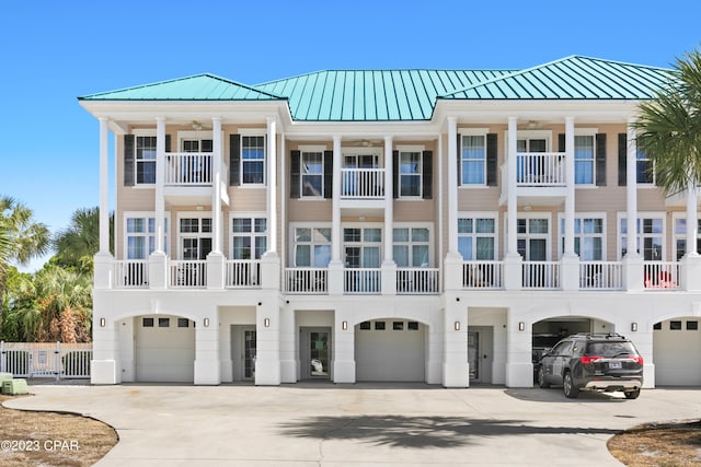 view of front of house with a balcony and a garage