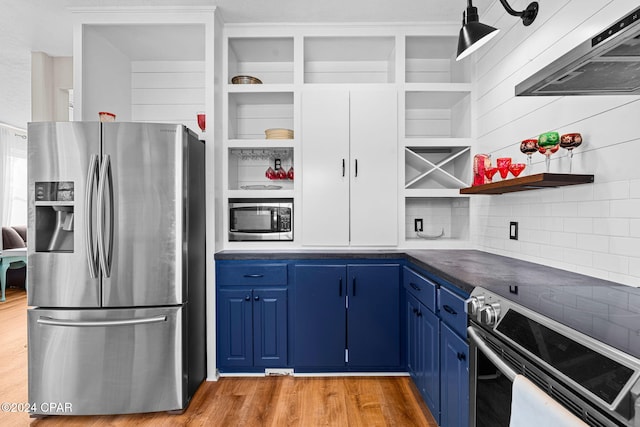 kitchen featuring blue cabinetry, stainless steel appliances, range hood, and light hardwood / wood-style flooring