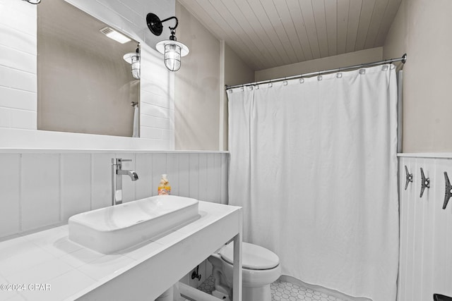 bathroom with toilet and sink