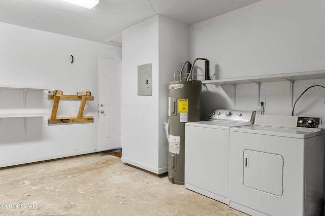 laundry room featuring electric water heater, separate washer and dryer, and electric panel