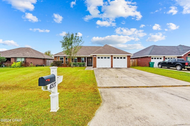 single story home with a front yard and a garage