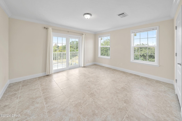 unfurnished room with ornamental molding