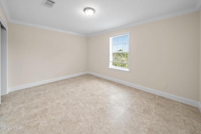 16246 E Lullwater, Panama City Beach, FL 32413 - empty room featuring crown molding, baseboards, and light tile patterned floors