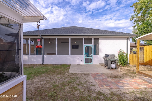 view of yard featuring a shed and a sunroom