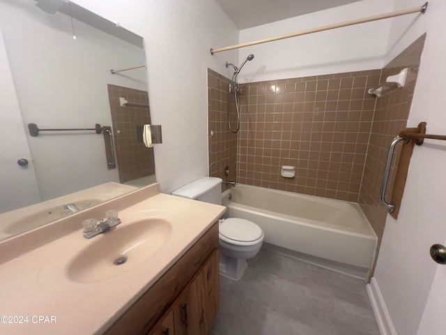 full bathroom with vanity, toilet, and tiled shower / bath