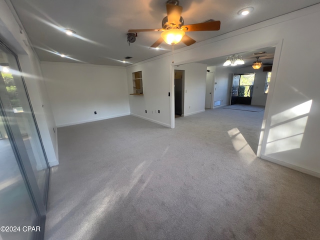 carpeted empty room with ceiling fan