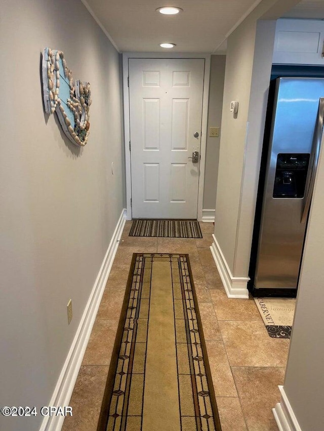 entryway featuring tile patterned flooring