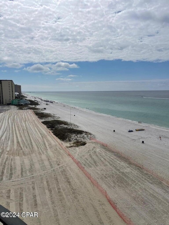 view of water feature with a beach view