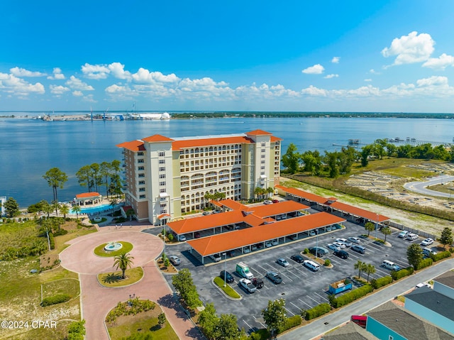 birds eye view of property with a water view