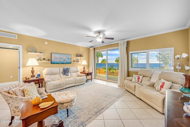 tiled living room with ornamental molding and ceiling fan