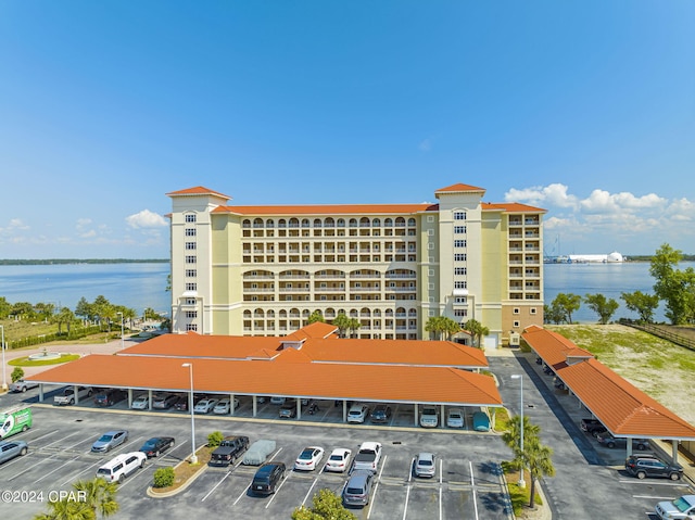 view of building exterior with a water view