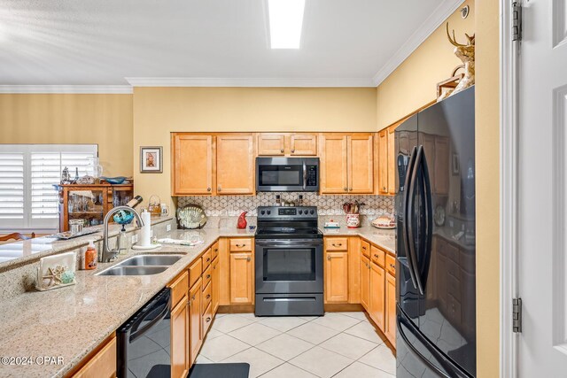 kitchen featuring black appliances, sink, light tile patterned flooring, crown molding, and light brown cabinetry