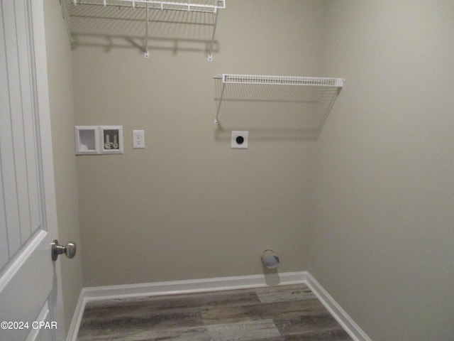 clothes washing area featuring hookup for a washing machine, electric dryer hookup, and hardwood / wood-style flooring