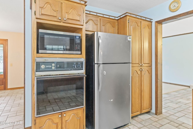 kitchen featuring appliances with stainless steel finishes