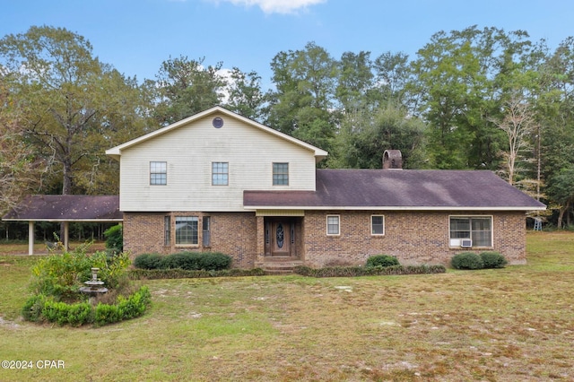 view of front of home featuring a front yard