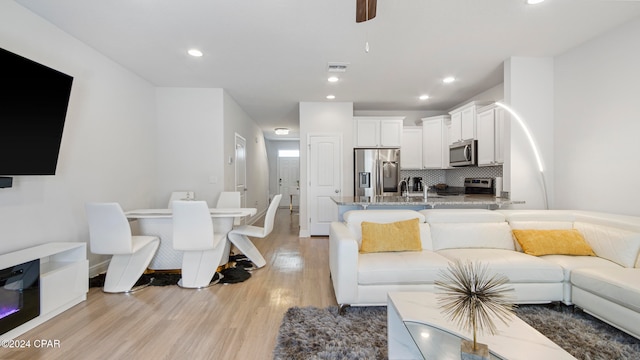 living room featuring light wood-type flooring