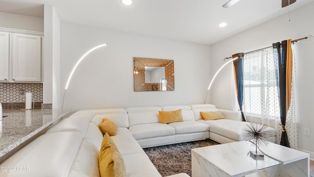 living room with ceiling fan