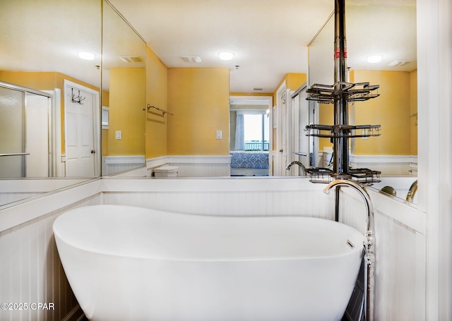 bathroom featuring a washtub