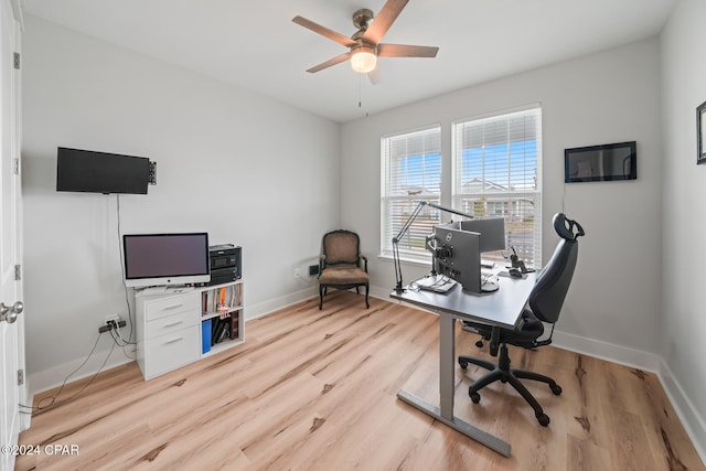 office area featuring light hardwood / wood-style flooring and ceiling fan