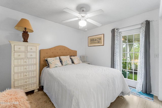 bedroom with ceiling fan and light wood-type flooring