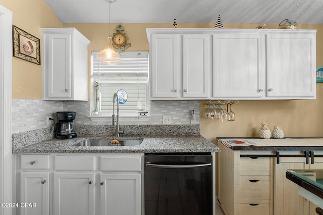 kitchen featuring white cabinets, dishwasher, sink, and tasteful backsplash