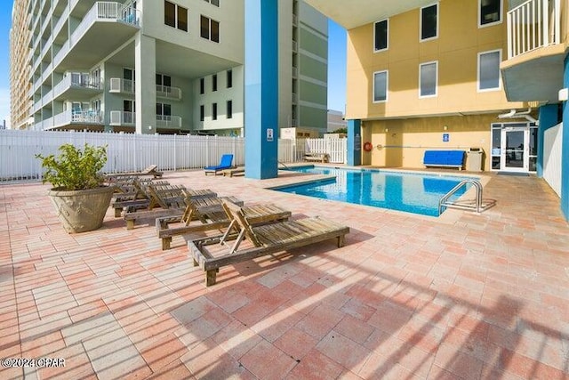 view of pool with a patio